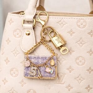 Authentic Louis Vuitton Gold Lock & Key with unbranded Purple Tweed Bagcharm